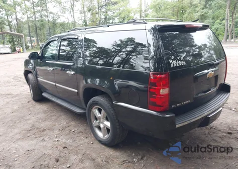 2011 Chevrolet Suburban 1500 Ltz z USA, uszkodzony, nr VIN 1GNSKKE3XBR195337